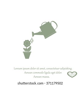 Watering can with flower