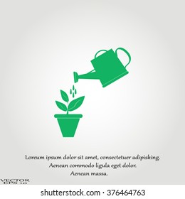 Watering can with flower