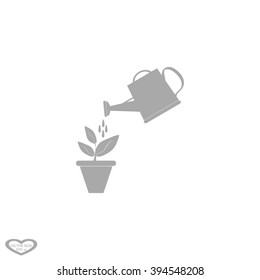 Watering can with flower