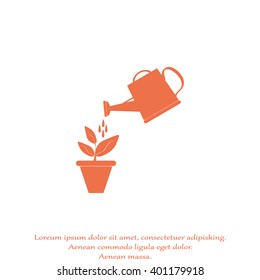 Watering can with flower