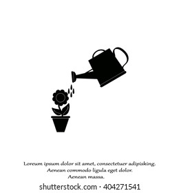Watering can with flower