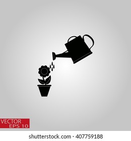 Watering can with flower