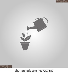 Watering can with flower