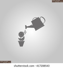 Watering can with flower