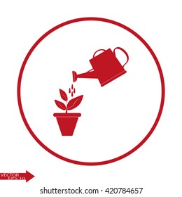 Watering can with flower