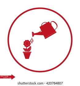 Watering can with flower