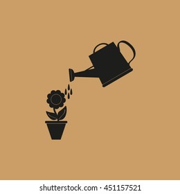 Watering can with flower