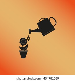 Watering can with flower