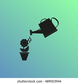 Watering can with flower
