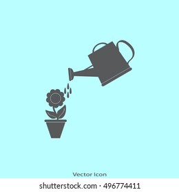 Watering can with flower
