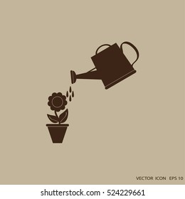 Watering can with flower