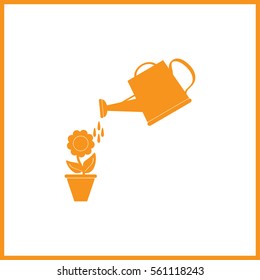 Watering can with flower