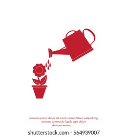 Watering can with flower