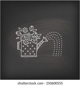 watering can flowers
