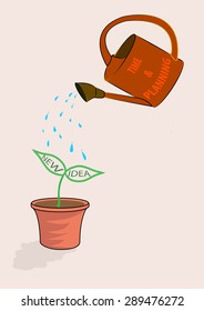 Watering can and plant. Growing idea concept