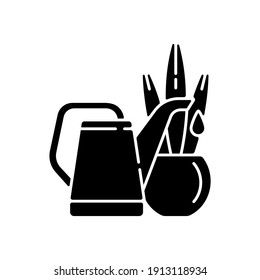 Watering plants black glyph icon. Housekeeping chore, urban gardening. Horticulture hobby silhouette symbol on white space. Decorative potted houseplant and water can. Vector isolated illustration