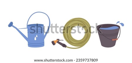 Watering tools set with stainless steel can, garden hose with dispenser and bucket isolated on white