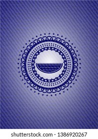 watermelon icon inside badge with denim texture