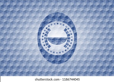 watermelon icon inside blue emblem or badge with abstract geometric pattern background.