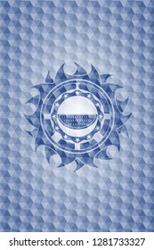 watermelon icon inside blue polygonal emblem.