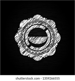watermelon icon inside chalkboard emblem on black board