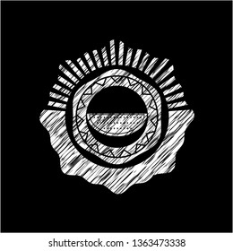watermelon icon inside chalkboard emblem on black board