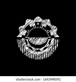 watermelon icon inside chalkboard emblem written on a blackboard