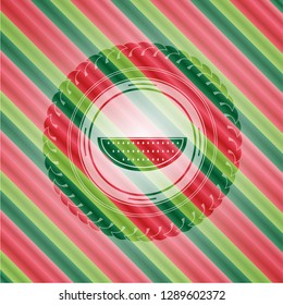 watermelon icon inside christmas style emblem.