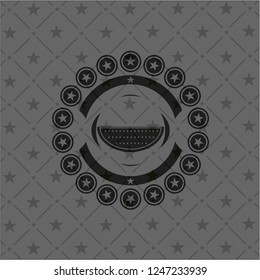 watermelon icon inside dark emblem. Retro