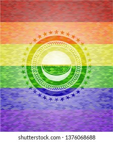 watermelon icon inside emblem on mosaic background with the colors of the LGBT flag