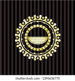 watermelon icon inside gold emblem