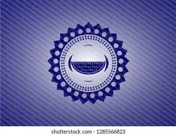 watermelon icon inside jean or denim emblem or badge background