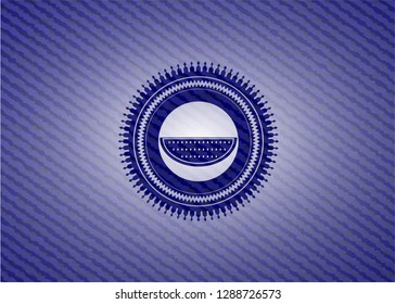 watermelon icon inside jean or denim emblem or badge background