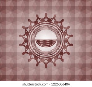 watermelon icon inside red seamless badge with geometric pattern background.