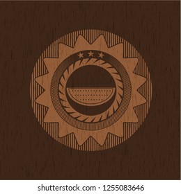 watermelon icon inside retro wood emblem