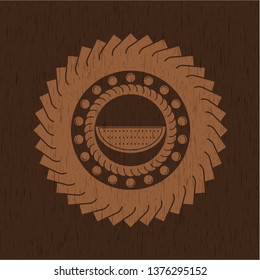 watermelon icon inside retro wooden emblem
