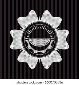 watermelon icon inside silvery emblem