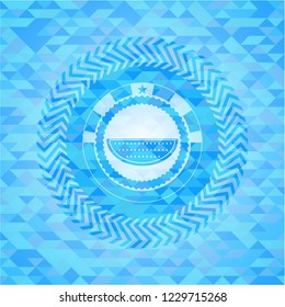 watermelon icon inside sky blue emblem. Mosaic background