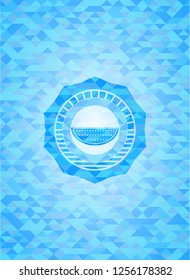 watermelon icon inside sky blue emblem with triangle mosaic background
