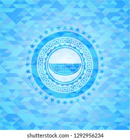 watermelon icon inside sky blue mosaic emblem