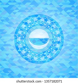 watermelon icon inside sky blue emblem with mosaic background