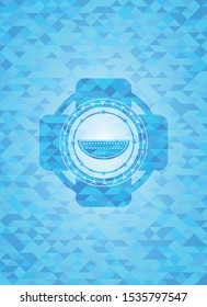 watermelon icon inside sky blue mosaic emblem