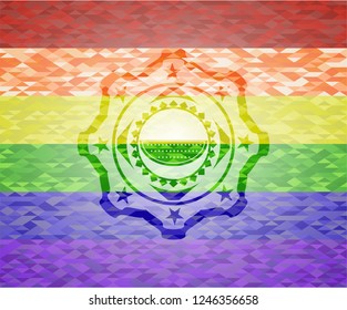 watermelon icon on mosaic background with the colors of the LGBT flag