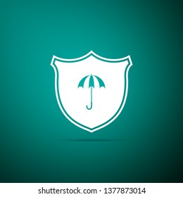 Waterproof icon isolated on green background. Shield and umbrella. Water protection sign. Water resistant symbol. Flat design. Vector Illustration