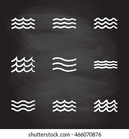 Wave icon set. Water line signs collection isolated on blackboard texture with chalk rubbed background. Vector illustration.