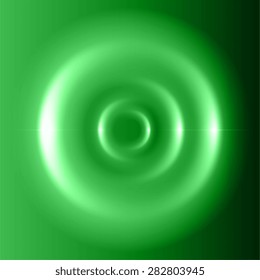 Waves on green water from falling drop.