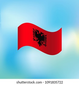 Waving flag of Albania. Wavy flag with transparent shadows on the blue sky with white clouds. Icon. Isolated Vector Illustration.