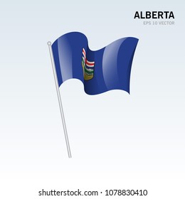 Waving flag of Alberta provinces of Canada isolated on gray background