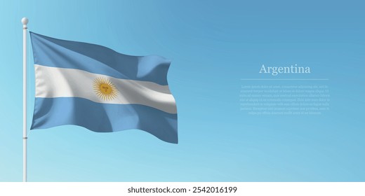 Waving flag of Argentina on a pole with a blue sky backdrop with copyspace