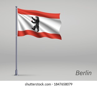 Waving flag of Berlin - state of Germany on flagpole. Template for independence day 